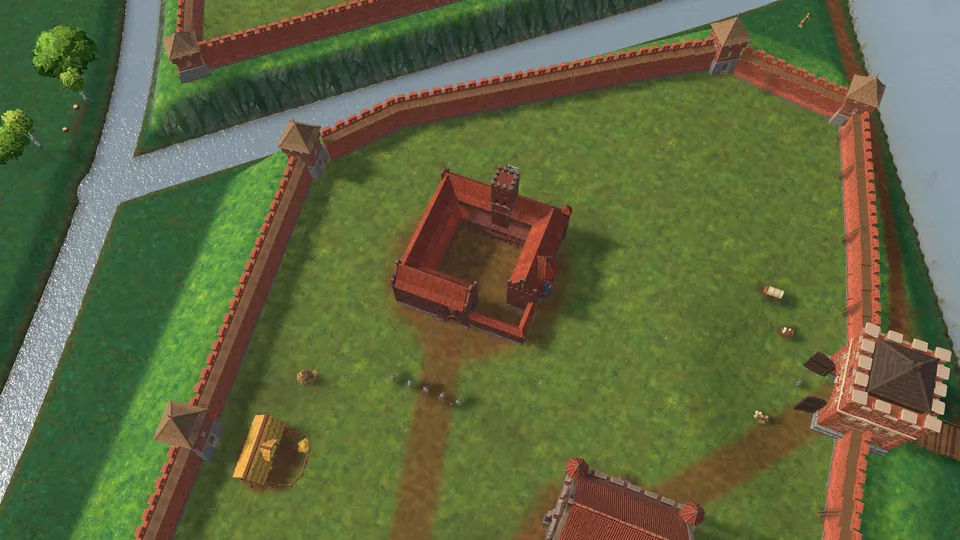A brick castle inside a rampart and palisade, seen from above